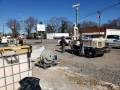 Injection of oxidizing compound for site remediation